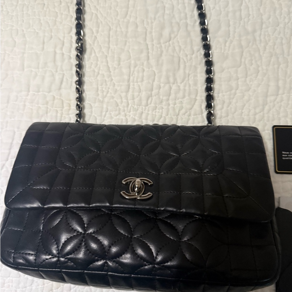 CHANEL Black Quilted Leather Shoulder Bag with Silver CC Lock
